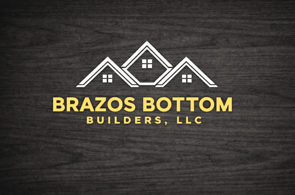Logo for Brazos Bottom Builders, LLC featuring three stylized white house rooftops with windows above the business name in bold yellow text on a dark wood textured background.
